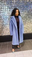 The stylishly warm and cozy teddy coat in the color blue